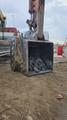 Просеивающий ковш на Hitachi-450. Смазка запрещена